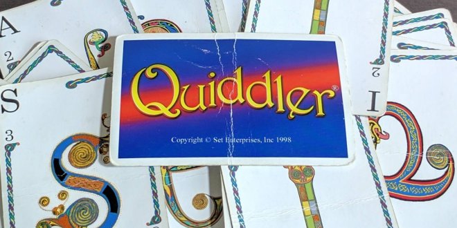 Pile of Quiddler cards on a table