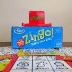 Zingo game with board tiles underneath