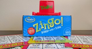 Zingo game with board tiles underneath